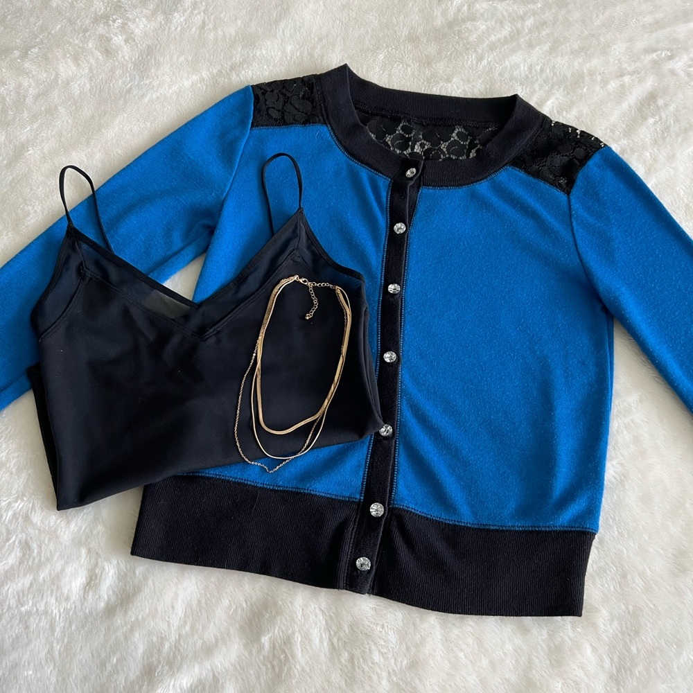 Princess Vera Wang cardigan with sparkling buttons.
